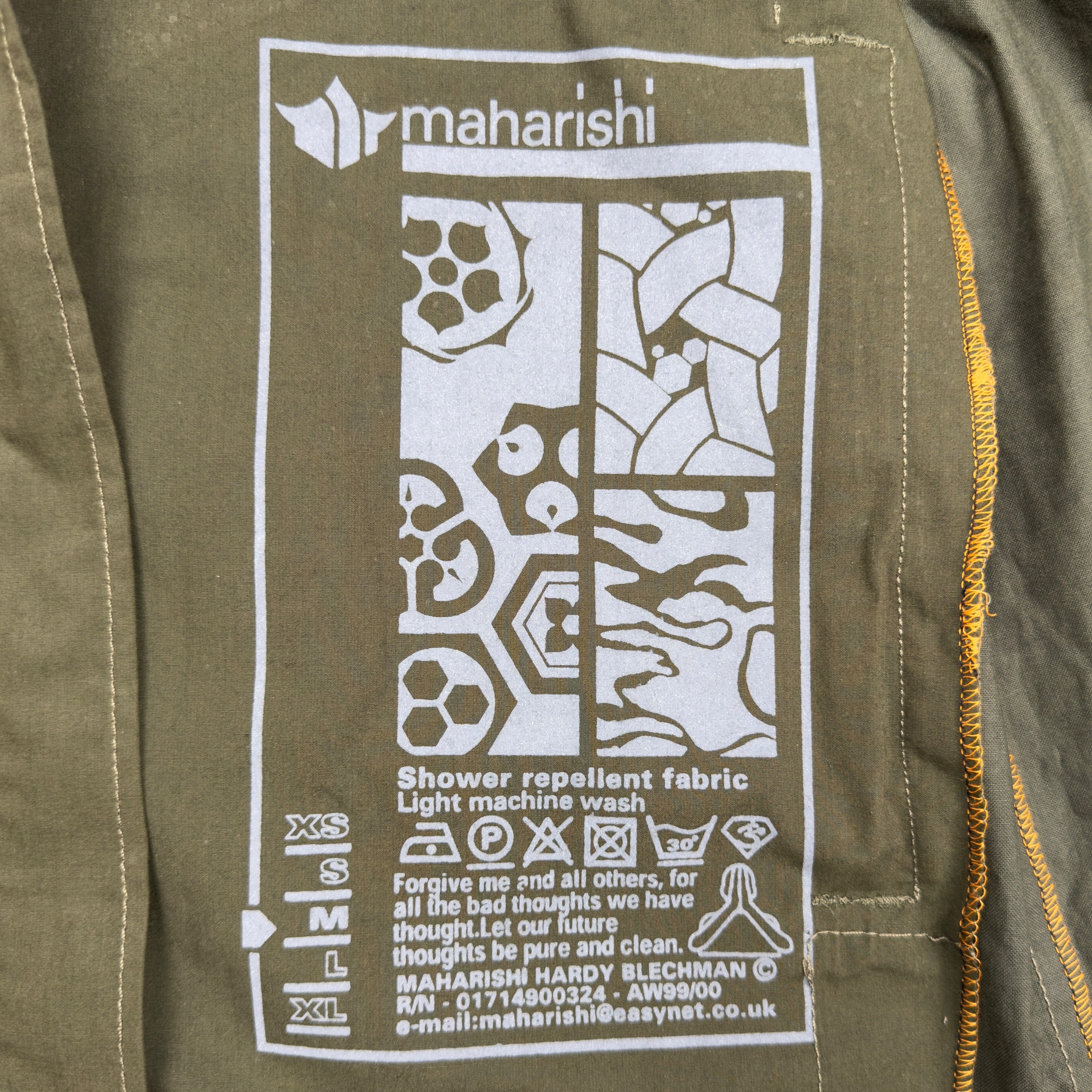FW99/00 ASYMMETRIC SHOWER REPELLENT JACKET