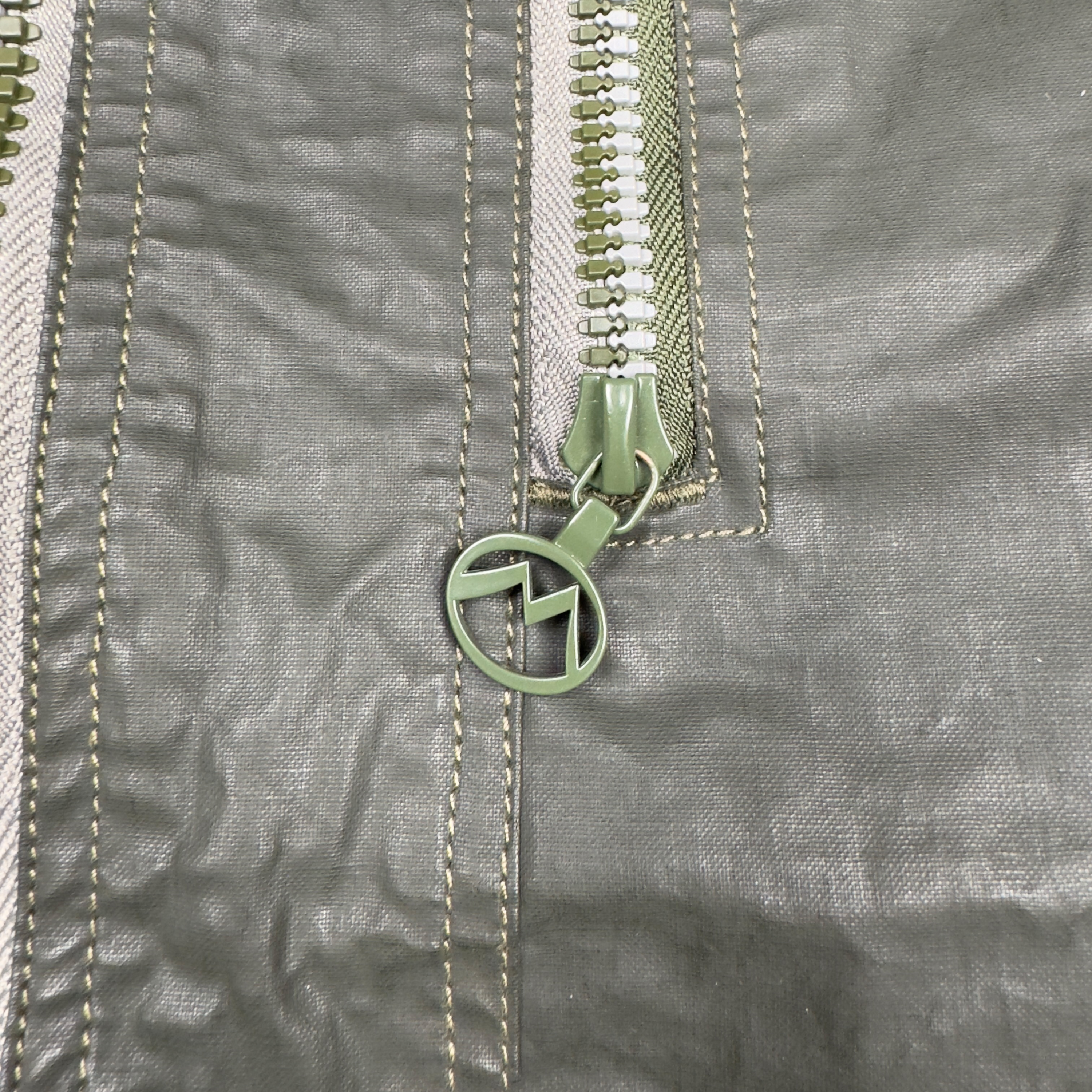 FW99/00 ASYMMETRIC SHOWER REPELLENT JACKET