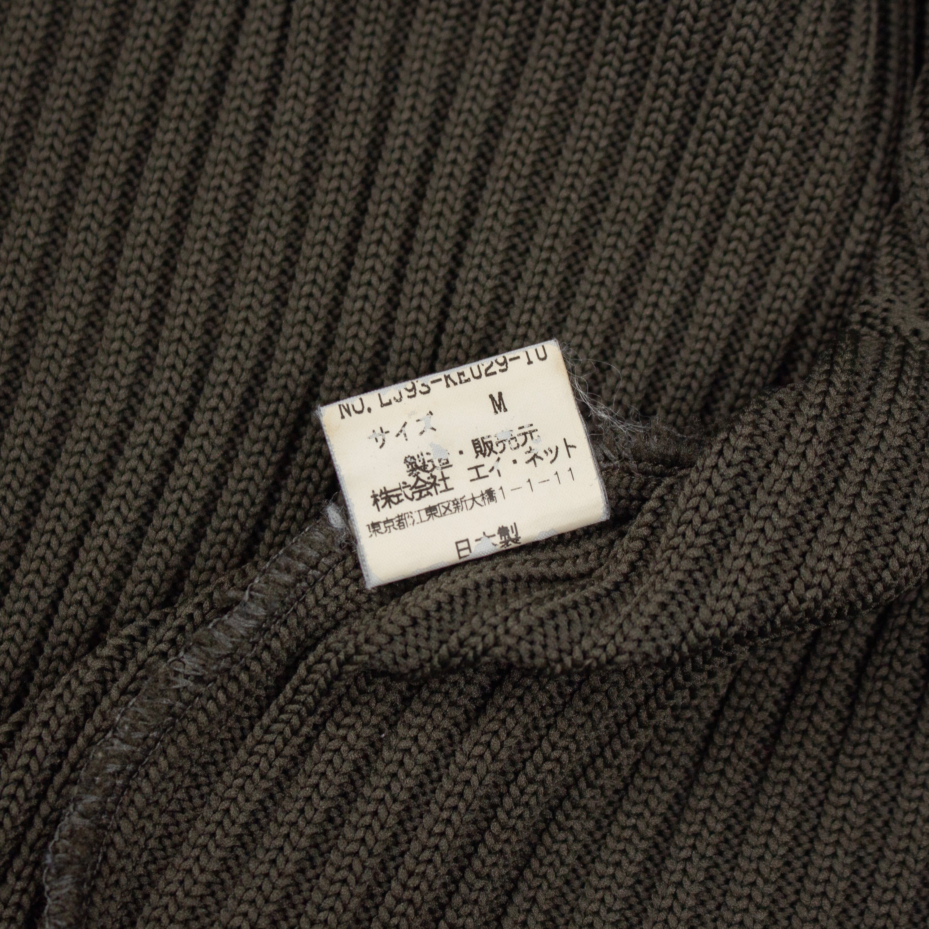 ASYMMETRIC STITCH KNITTED VEST